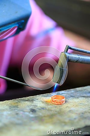Goldsmith making ring Stock Photo