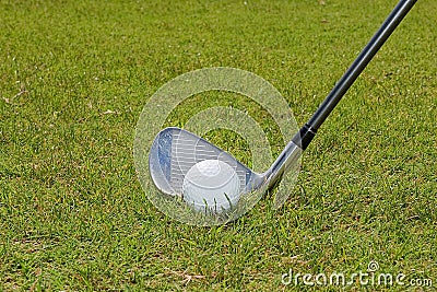 Golf Ball And Golf Club Stock Photo