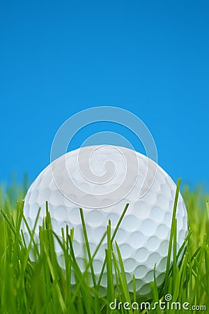 Golf ball in grass Stock Photo