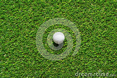 Golf ball on green grass texture of golf course for background. Stock Photo