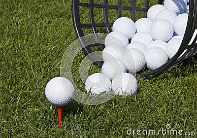 Golf ball teed up Stock Photo