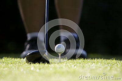 Golf ball teed up Stock Photo