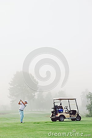 Golf cart man Stock Photo