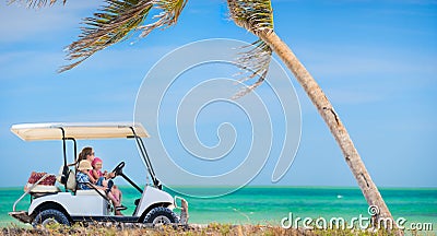 Golf cart at tropical beach Stock Photo