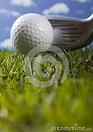 Golf club with ball on a tee Stock Photo