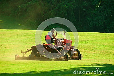 Golf Course Mowing Stock Photo