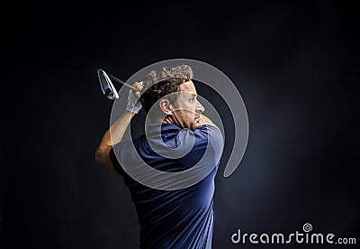 Close-up of a golf player intent on perfecting the swing Stock Photo