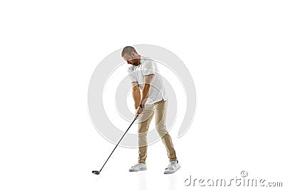 Golf player in a white shirt practicing, playing isolated on white studio background Stock Photo