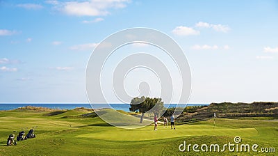 Golf players at golf course Editorial Stock Photo