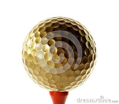 Golfball in gold Stock Photo