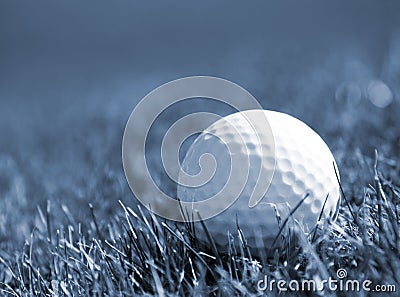 Golfball in grass Stock Photo