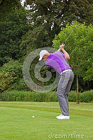Golfer backswing Stock Photo