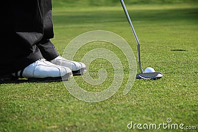 Golfer putting Stock Photo