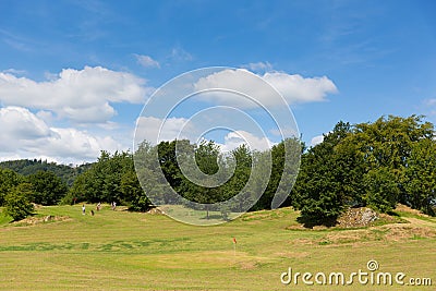 Golfers on Bowness on Windermere Golf mini golf course Cumbria Lake District a popular tourist activity in summer Editorial Stock Photo