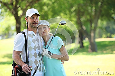 Golfing couple Stock Photo