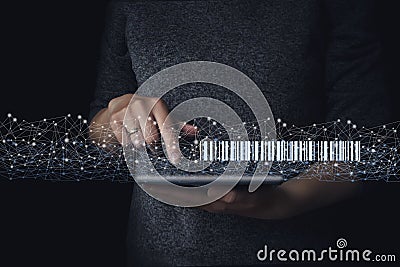 Gologram barcode scan on tablet in hand, warehouse and logistics. Home delivery service. Modern warehouse management technology Stock Photo