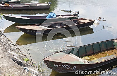 Golubac, Serbia - June 05, 2016: Old fishing boats tied up on th Editorial Stock Photo