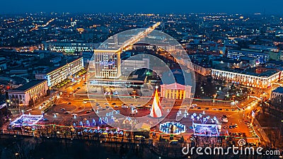 Gomel, Belarus. Main Christmas Tree And Festive Illumination On Lenin Square In Homel. New Year In Belarus. Aerial Night Editorial Stock Photo