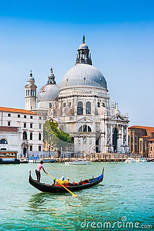 Gondola on Canal Grande with Basilica di Santa Maria della Salute, Venice, Italy Editorial Stock Photo