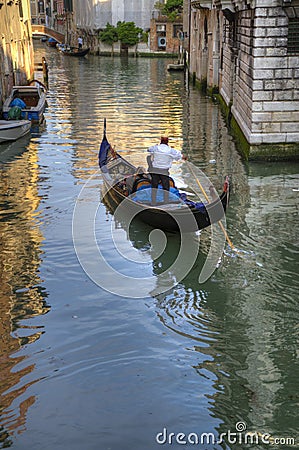 Gondola and gondolier, Venice, Italy Editorial Stock Photo