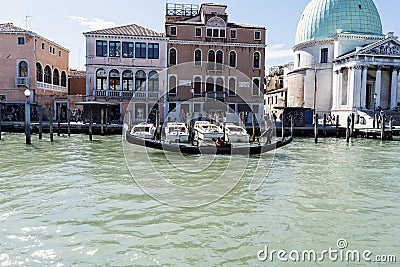 Gondola passing in front of the street called & x22;Fondamenta San Simeon Piccolo& x22; from the canal Editorial Stock Photo