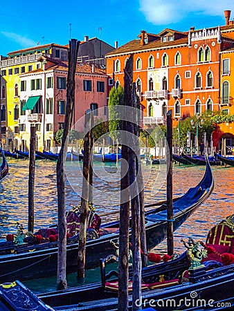 Gondola's on the Grand Canal in Venice, Italy, with stunning building backdrop. Editorial Stock Photo