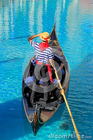 Gondola with tourists in a canal, Venetian Resort hotel and casino, Las Vegas, Nevada Editorial Stock Photo