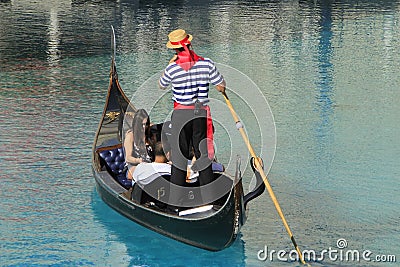 Gondola with tourists in a canal, Venetian Resort hotel and casino, Las Vegas, Nevada Editorial Stock Photo