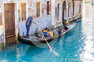 Gondola with tourists. Venice. Italy Editorial Stock Photo