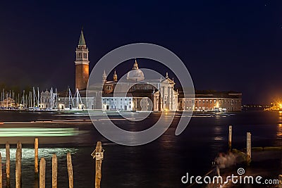 Gondolas, Grand Canal and San Giorgio Maggiore Church at night, Venice Stock Photo
