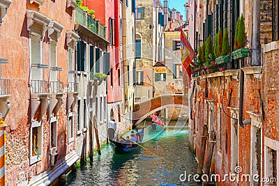 Gondolas on lateral narrow Canal in Venice, Italy Editorial Stock Photo