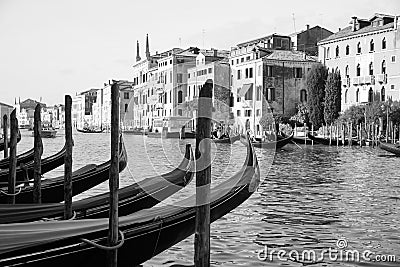 Gondolas moored at the Grand Canal in Venice, northern Italy. Editorial Stock Photo