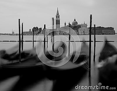 gondolas in movement without people and the church of Saint Stef Stock Photo