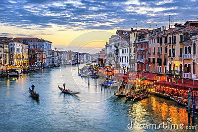 Gondolas at sunset in Venice Stock Photo