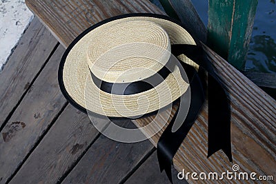 Gondolier Hat on Bench Stock Photo