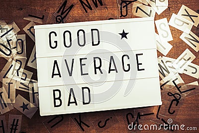 Good, Average, Bad on Lightbox Stock Photo