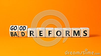 Good or bad reforms symbol. Concept words Good reforms Bad reforms on beautiful wooden blocks. Beautiful orange table orange Stock Photo