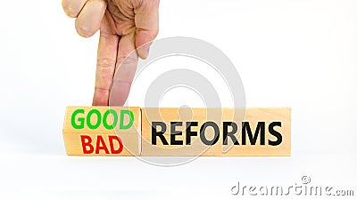 Good or bad reforms symbol. Concept words Good reforms Bad reforms on beautiful wooden blocks. Beautiful white table white Stock Photo