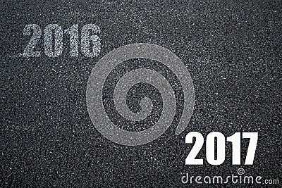 Good bye Old year 2016 and Happy New year 2017 on Asphalt Texture Background Stock Photo