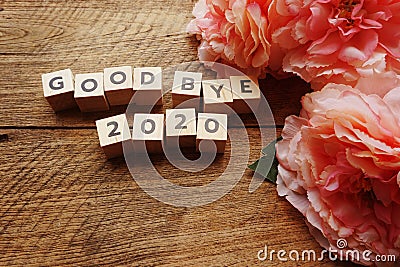Good Bye 2020 word letter with space copy on wooden background Stock Photo
