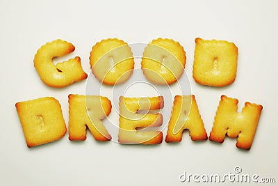 Good dream word from alphabet biscuits on white background Stock Photo