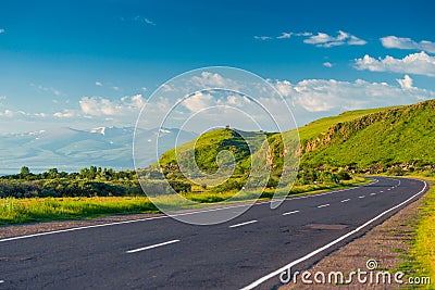 Good empty mountain road with a picturesque view of the mountains, the landscape Stock Photo