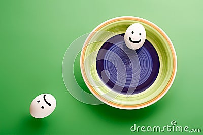 Good and evil concept with white eggs Stock Photo