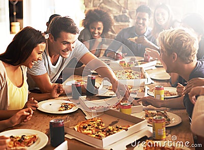 Good food with great friends. a group of friends enjoying pizza together. Stock Photo