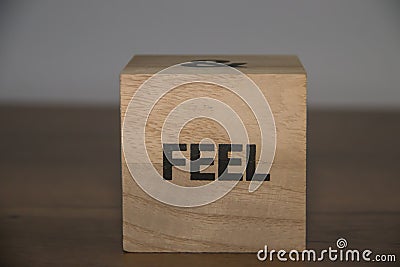 Love, good life, feel. Positive inspirational messages and words on wooden cubes Stock Photo