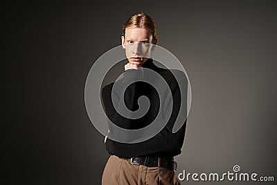 good looking non binary person looking Stock Photo