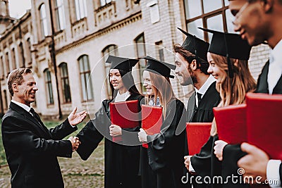 Good Mood. Teacher. Students Diplomas. University. Stock Photo