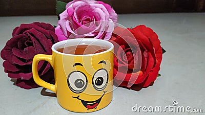 Good Morning wishes with a tea and flowers Stock Photo