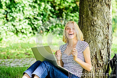 Good news. girl blogger write post for social network. modern woman with notebook blogging outdoor. girl runs her blog Stock Photo