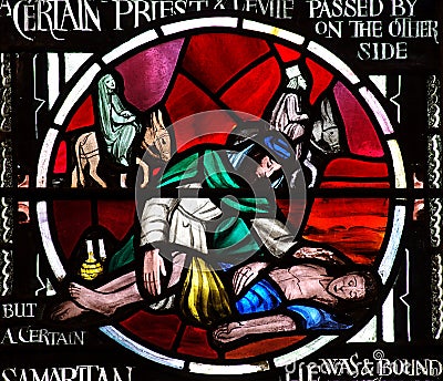 The Good Samaritan in stained glass Stock Photo